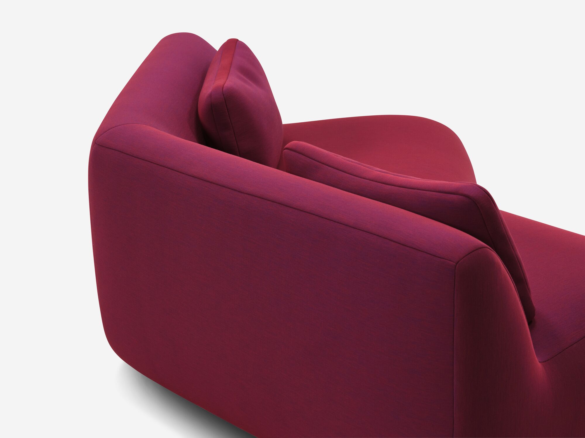 Back detail view of red purple curved sofa